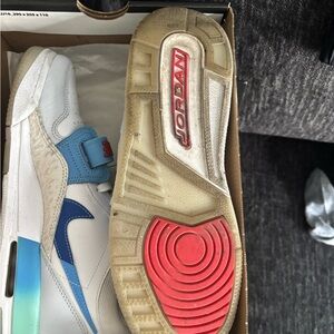 Jordan Sneakers with White and Blue Highlights